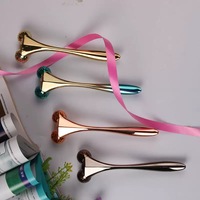 Rouleau de massage facial en métal à double boule, outil portable de lifting du visage, anti-gonflement, soin de la peau pour le visage et le corps
