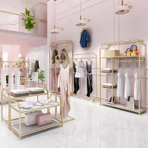 Personalizzato Negozio di Abbigliamento Visualizzazione Boutique Basamento In Acciaio Inox Lucido Oro Indumento Rack Per Negozi di Abbigliamento