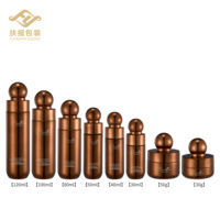 Ensemble de flacons cosmétiques en verre bronze de luxe, flacon de lotion pour soins de la peau, flacon d'essence, pot de crème, emballage cosmétique vide, bouchon rond, logo personnalisé