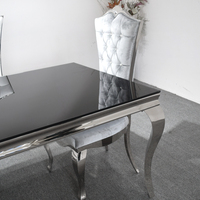 Top en verre noir avec miroir et 6 chaises en acier inoxydable, Table à manger moderne en acier inoxydable, 4 places avec pieds de serpent