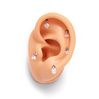 Vente en gros de Piercings Labret à enfiler en Titane G23 ASTM F136, motif fleur à dos plat, clous d'oreille tendance, bijoux de lèvre délicats