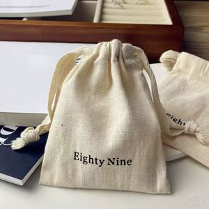 High Quality Cotton <b>Drawstring</b> <b>Pouch</b> Custom Cotton Packaging Bag Beige Cotton <b>Drawstring</b> Bag With With Herringbone String - Product Image 3