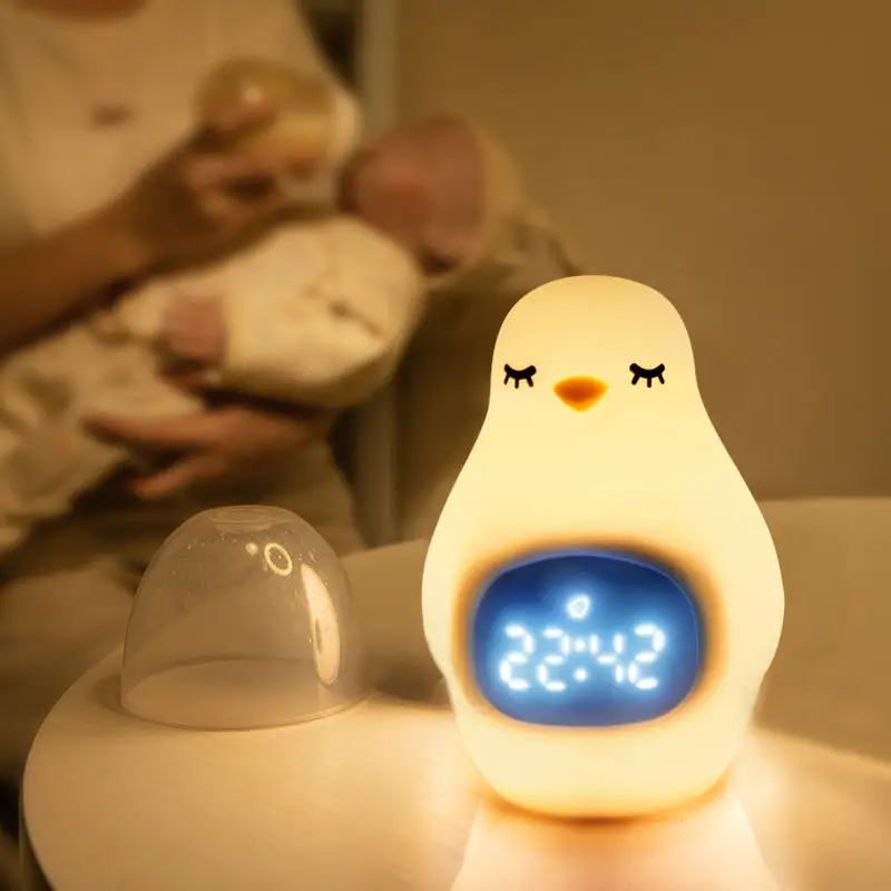 유럽 핫 세일 아이 아기 스마트 탁상 시계 ABS 실리콘 빛 만화 펭귄 알람 시계 어린이 수면 트레이너