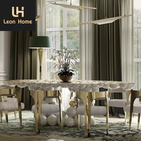 Table laquée blanche de luxe personnalisée Table de salle à manger 5 étoiles Hotel Villa Table à manger design boule en acier inoxydable