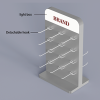 Vitrine de présentation verticale pour lunettes de soleil avec éclairage LED, construction en acrylique et métal