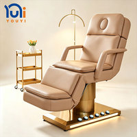 Table de massage électrique inclinable pour soins du visage avec tabouret, base dorée, pour spa, salon de beauté et clinique esthétique