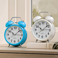 Nouvelle petite horloge de chevet mécanique avec réveil, design mignon de dessin animé pour étudiants et enfants, en métal lumineux, avec fonction FM pour le réveil et le salon