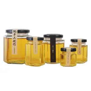 wholesale empty clear food glass storage jar hexagonal honey jar glass with metal lid