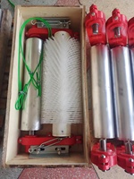 Convoyeur à bande pour mines d'énergie Balayeuse rotative sans puissance Brosse à rouleau en acier nylon résistant à l'usure de forme longue pour le nettoyage des commerces de détail