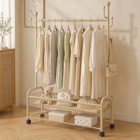 Porte-vêtements double en métal 150 cm avec base en plastique, anti-rouille, gain de place, moderne, pour salon, manteaux, vêtements, chapeaux et sacs