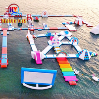 Grand parc aquatique gonflable parc aquatique flottant à prix d'usine avec de nombreux jeux d'eau amusants