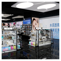 Vitrine de magasin de cosmétiques sur roulettes, design moderne, éclairée par LED, écologique, durable, pour la décoration intérieure des magasins de détail