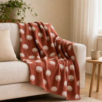 Plaid en jacquard double face 100% polyester avec ourlets triangulaires à points invisibles sur les 4 coins