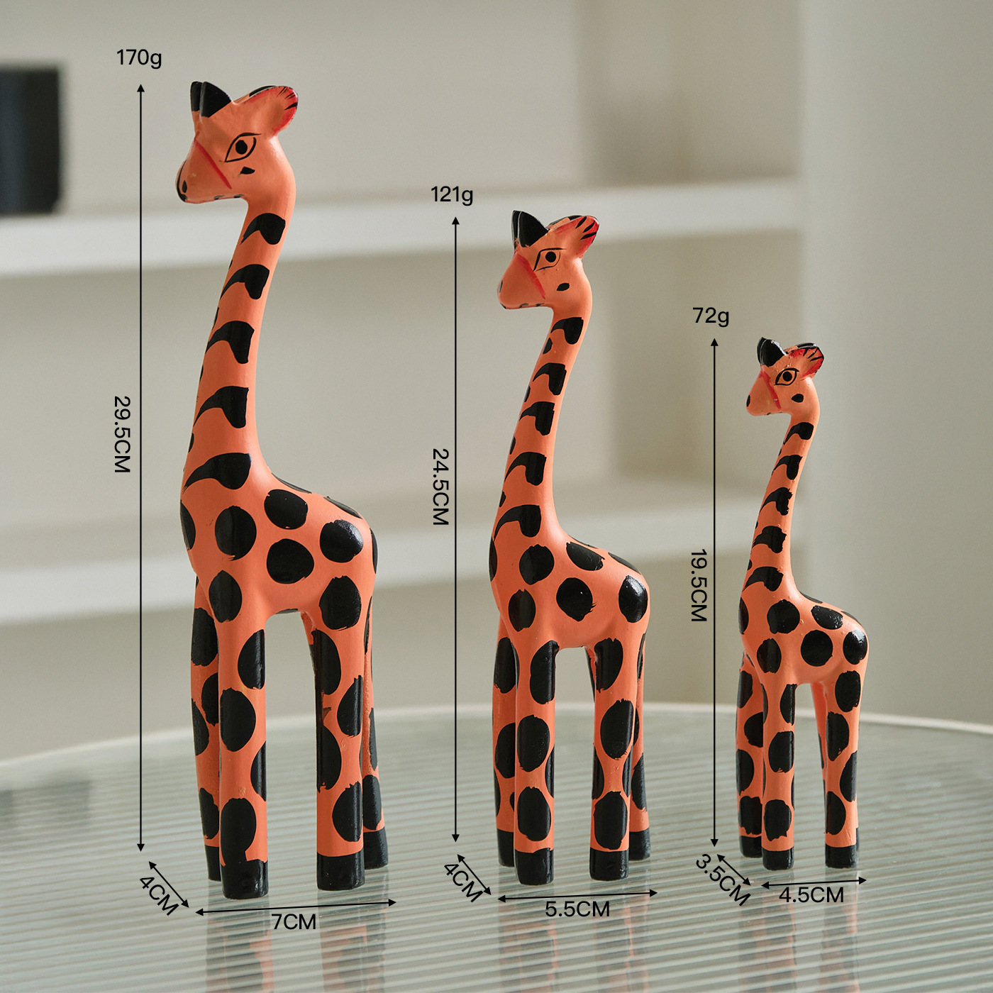 A set of yellow giraffe figurines