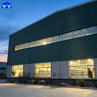 Bâtiment d'entrepôt préfabriqué à grande portée en acier Q355B avec de grands fenêtres