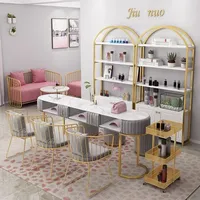 La couleur et la taille de la table de manucure en marbre velours rose de luxe peuvent être personnalisées ensembles de tables et de chaises pour ongles de meubles de beauté