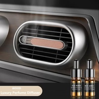 Clip d'aromathérapie réglable pour grille d'aération de voiture, en alliage d'aluminium de qualité supérieure, avec éclairage d'ambiance, diffuseur de parfum de luxe et ornement décoratif