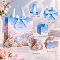 Sac en papier cadeau personnalisé avec poignée en ruban, motif floral bleu pastel, plusieurs tailles, impression personnalisée, emballage de marque