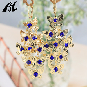 أقراط هاواي المصنوعة يدويًا مطلية بالذهب ، طوق أذن بشراشيب طويل مع فراشة نسائية ، أقراط متدلية أنيقة مشهورة للنساء - Product Image 5