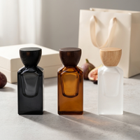 En stock, nouvelle arrivée, flacon de parfum vide noir de 30 ml et 50 ml avec fond épais, flacon en verre givré de haute qualité, boîte personnalisée