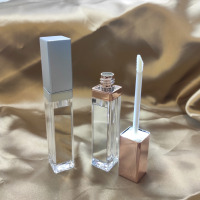 Tubes de brillant à lèvres LED dorés en gros avec impression sérigraphique, emballage cosmétique en plastique et miroir