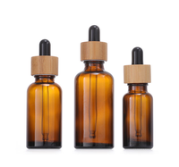 Grosir botol minyak esensial kaca Amber dengan tutup penetes bambu 5ml 10ml 30ml 50ml 100ml ukuran kosong untuk pembelian jumlah besar