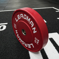 Plaques de poids en caoutchouc en gros, fournisseur en vrac, plaques de poids colorées en Lbs et kg pour les clubs de fitness