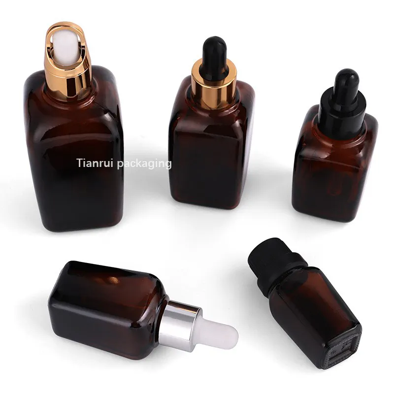 Wholesale Cosmetic Amber Glass Bottle 10ml 20ml 30 ml 50ml 100ml Square Essential Hair Oil Bottles with Gold Basket Dropper