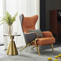 Fauteuil de relaxation ergonomique moderne en cuir avec cadre métallique, acier inoxydable, doré, idéal pour le salon, les loisirs, offre spéciale