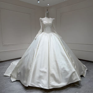 Robe de mariée de bal moderne en satin français texturé perlé à manches longues Xx59 avec appliques, décolleté cœur, dos nu et traîne chapelle - Product Image 1