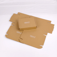 Boîte d'expédition personnalisée en papier kraft recyclable avec pelliculage mat et logo blanc imprimé UV – Emballage ondulé de qualité supérieure