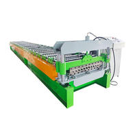 Machine de formage de tôles ondulées pour la fabrication de panneaux de tuiles métalliques pour la construction