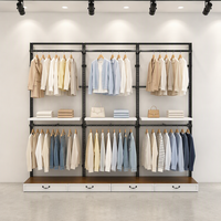 Portant à vêtements double rail noir sur pieds, avec étagère centrale et tiroirs inférieurs, vente en gros
