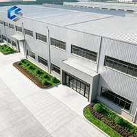 Entrepôt moderne en structure métallique industrielle préfabriquée galvanisée pour le stockage de marchandises lourdes et la logistique