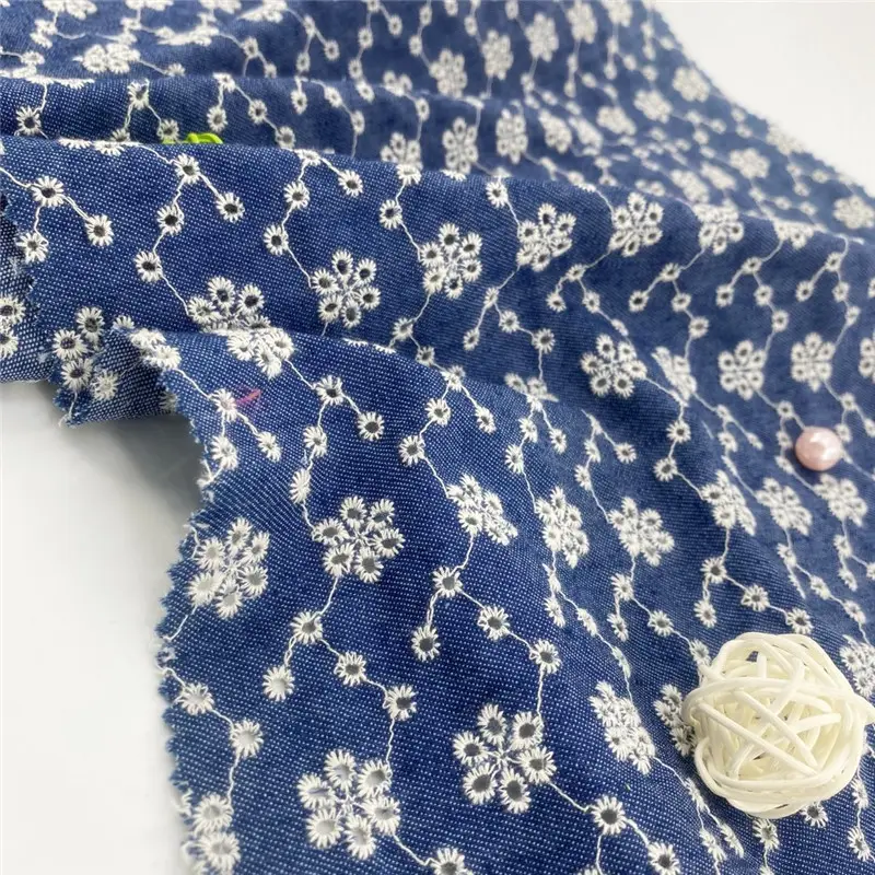 new style blue 100% cotton eyelet embroidery denim fabric for jeans and coat