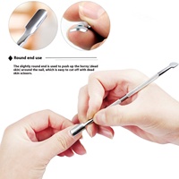 Poussoir à cuticules double face en acier inoxydable Outil de beauté pour le nettoyage des ongles