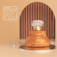 Nouveau design Logo personnalisé rond opaque motif artisanat ambre 100 ml flacon de parfum vide avec emballage