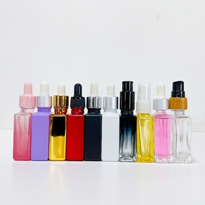 Vente en gros de flacons compte-gouttes en verre transparent pour huiles essentielles cosmétiques de 30 ml, 50 ml et 100 ml avec bouchons en or rose et argent - Product Image 2