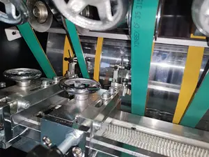 אוטומטי סרט למות חיתוך ו-v מכונת גריינג כדי להפוך תיבת אריזה