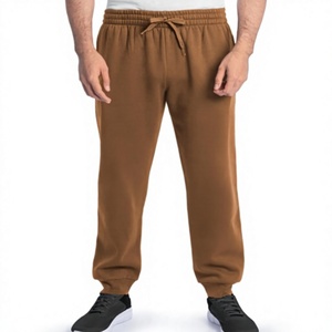 Pantalon de jogging léger et respirant pour homme en polyester et élasthanne noir, à taille élastique, avec braguette zippée et poches latérales, idéal pour le printemps - Product Image 1