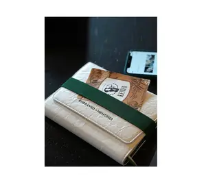 Wholesale Premium Color Scheme PU Craft Paper Feel Cover 100g Wood free Paper Wide Elastic Band Closure Trifold NotebookStylish