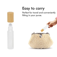 Bouteilles à rouleaux en verre dépoli 5ml 10ml 15ml vides rechargeables avec bouchon en bambou récipient pour distribution d'échantillon d'huile essentielle