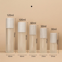 Offre Spéciale 1oz 2oz 4oz 30ml 50ml 60ml 100ml 120ml Pompe de lotion cosmétique givrée Flacon pulvérisateur en verre à brume fine avec couvercles en bambou