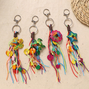 Breloque de sac bohème colorée en coquille de noix de coco avec pompon, porte-clés fait main, accessoire suspendu pour sac à dos ou voiture, style <span class=keywords><strong>hippie</strong></span> arc-en-ciel tressé pour fille, idéal pour les vacances - Product Image 1