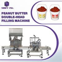 Dubbelkopige pasta-vulmachine, pindakaasvuller en afsluitapparatuur voor de verpakkingsinstallatie van notenbotervaten