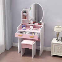 Coiffeuse blanche avec tiroirs roses et miroir, table de maquillage avec éclairage