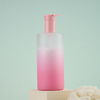 Botellas cilíndricas de PET esmerilado rosa degradado de 450 ml con tapa dispensadora para gel de baño, loción de manos, mascarilla facial y empaque de pelucas