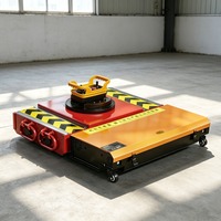 Chariot électrique robuste pour le déplacement de charges lourdes, adapté au relocalisation d'équipements d'usine
