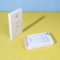 Boîte d'emballage personnalisée vide en carton blanc spécial avec estampage à chaud, doublure en éponge et poignée, pour masque facial jetable cosmétique