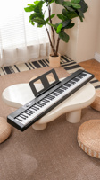 BDMUSIC Piano numérique agréable à 88 touches, clavier MIDI portable, pliable, en plastique, avec haut-parleur intégré, léger, pour adultes